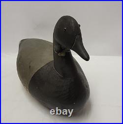 Hand carved Duck decoy, Signed by Bill Black Jr. And S. Maas